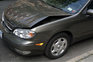 A close up of a car after a small crash